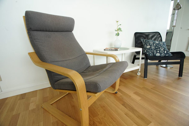 Two armchairs and a small table in the living room