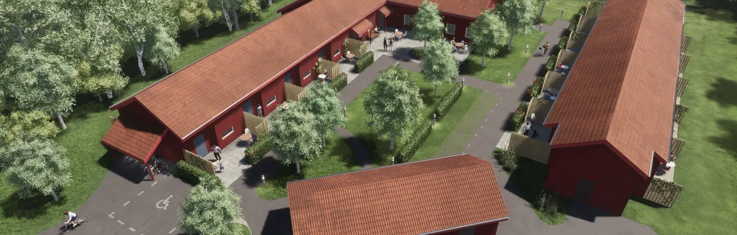 Visionsbild över det nya boendet på Hagtornsstigen i Trollhättan. Vitt tvåvåningshus i vinkel med sedumtak